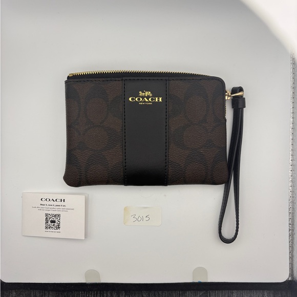 Coach Handbags - Coach Signature Brown and Black Wristlet